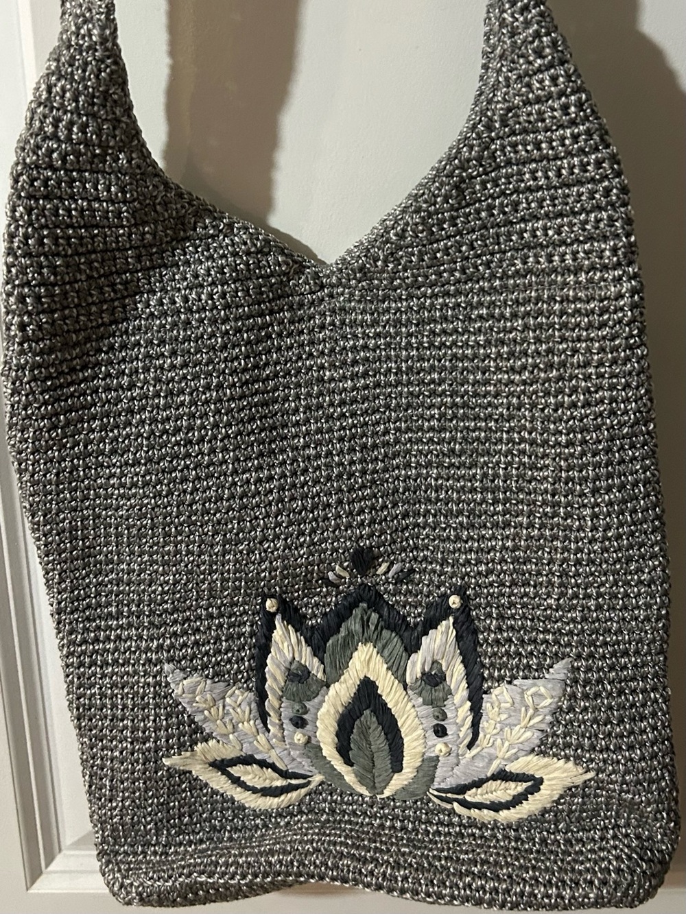 The Sak Gray Crochet Shoulder Bag with Embroidered Floral Accent